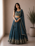 Kavya Regal Peacock Embroidered Lehenga Suit in Silk Teal